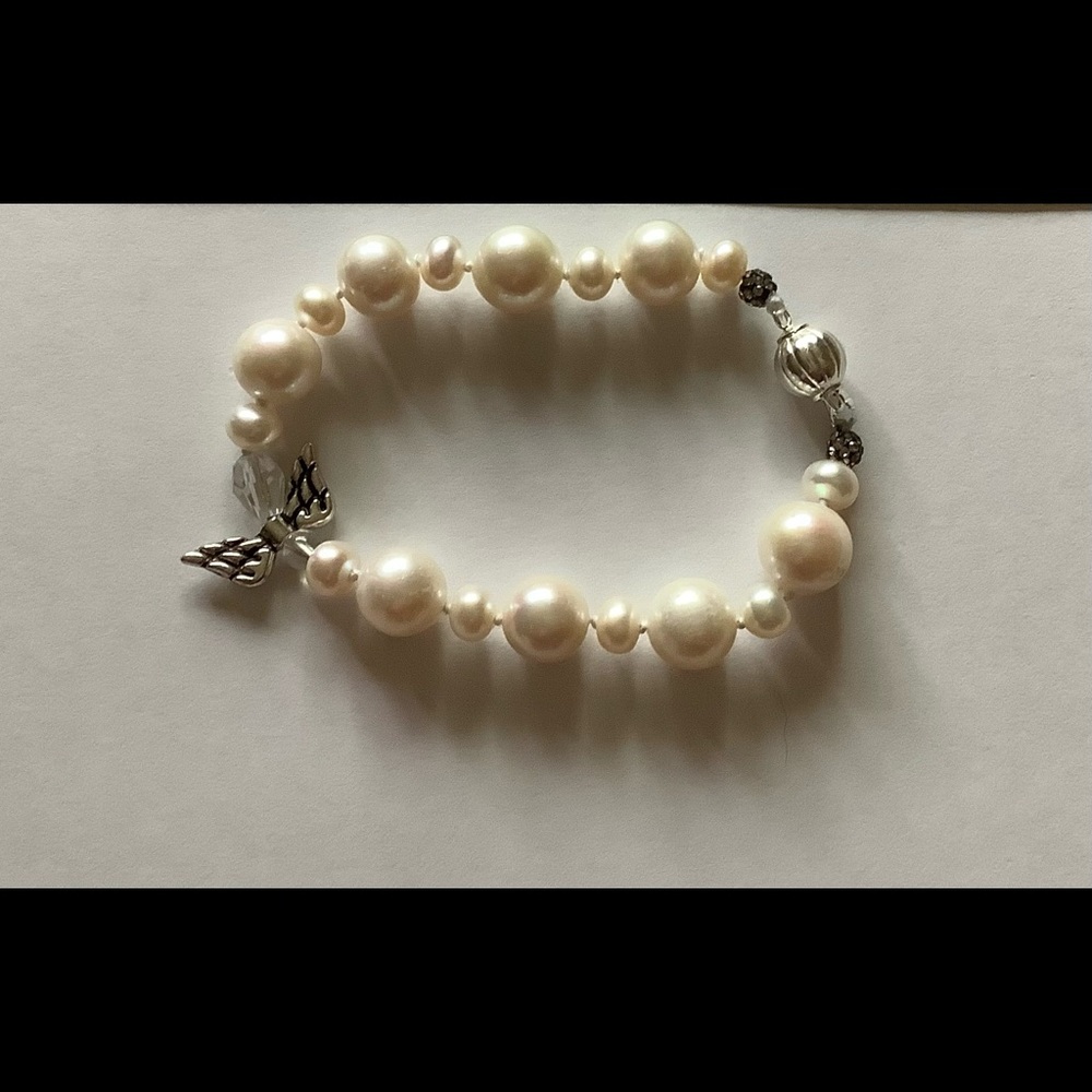 Hand knotted Pearl Bracelet w/Guardian Angel